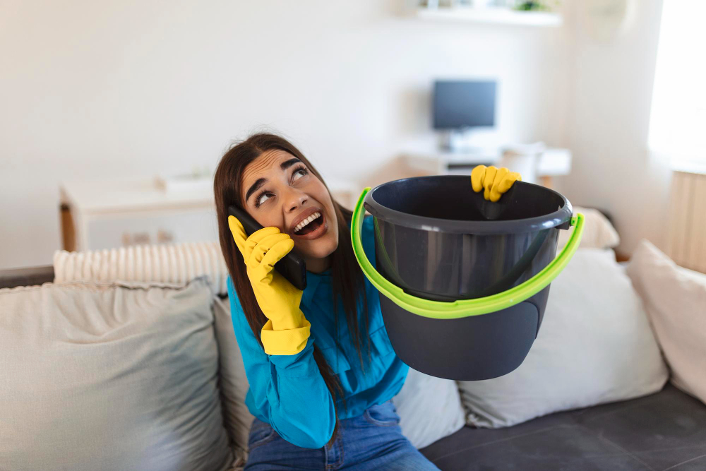 Chica con goteras del tejado